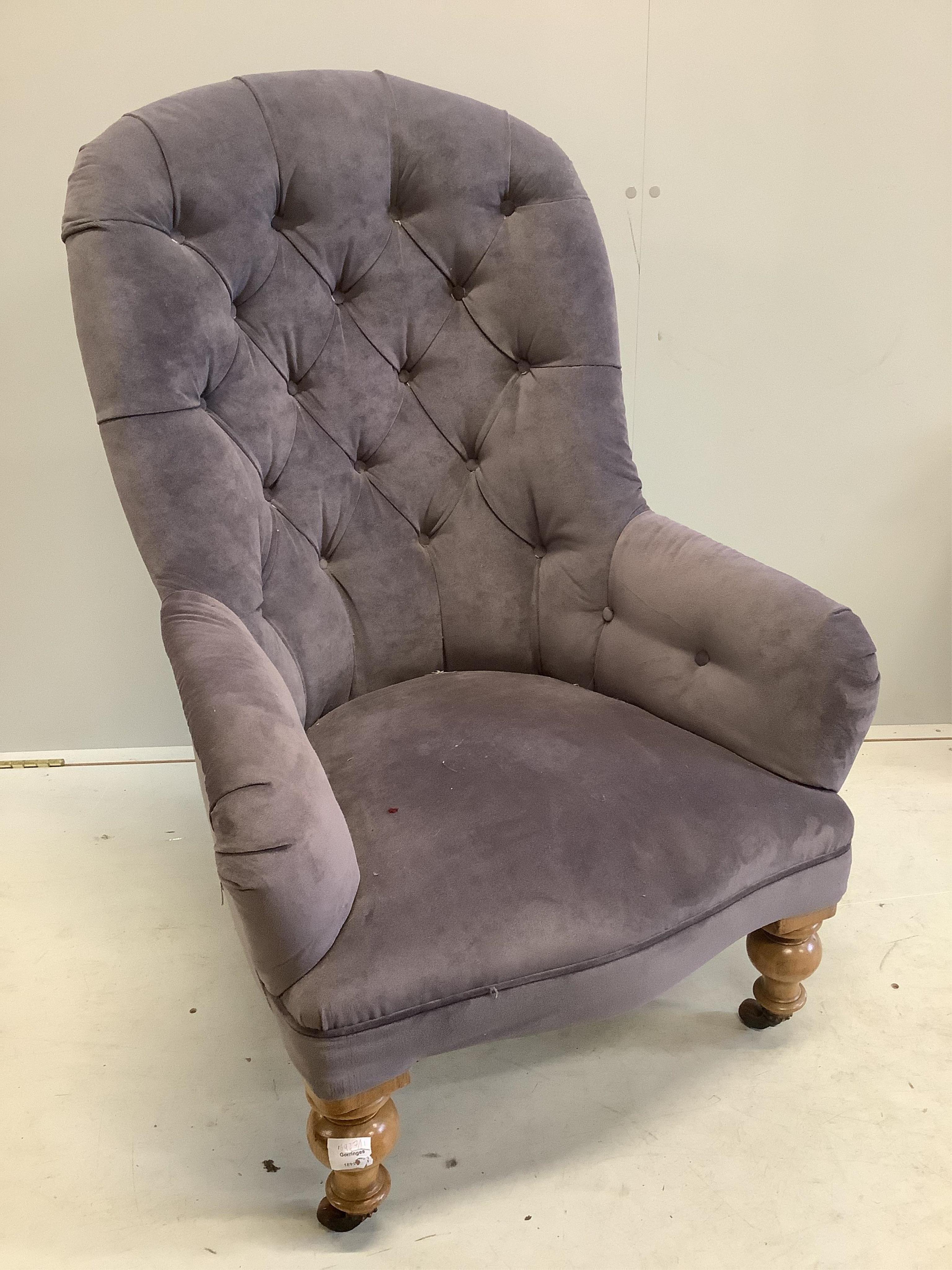 A Victorian upholstered spoonback armchair, width 68cm, depth 60cm, height 102cm. Condition - fair